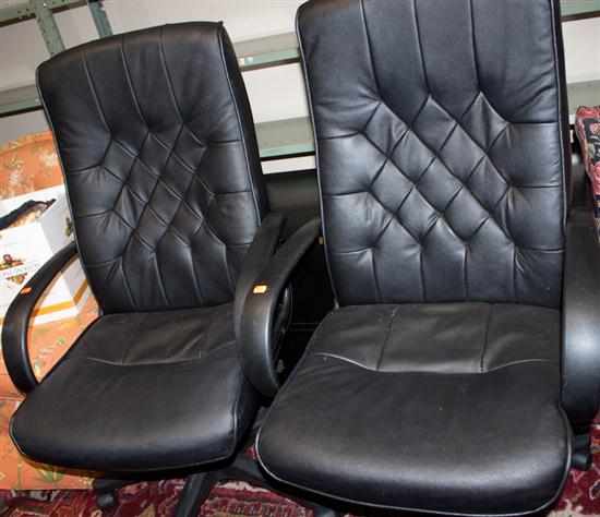 Appraisal: Pair of naugahyde swivel office chairs Estimate - No condition