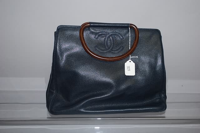 Appraisal: Chanel navy leather handbag w wooden handles Cert Good condition