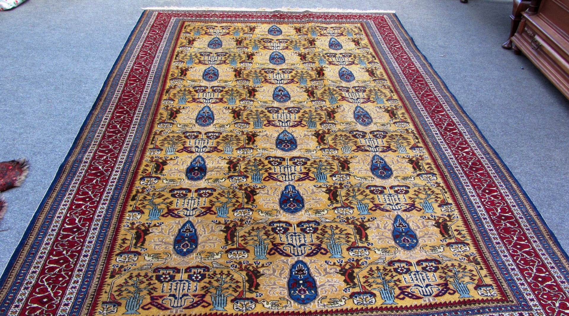 Appraisal: An Abudeh carpet Persian the saffron field with rows of