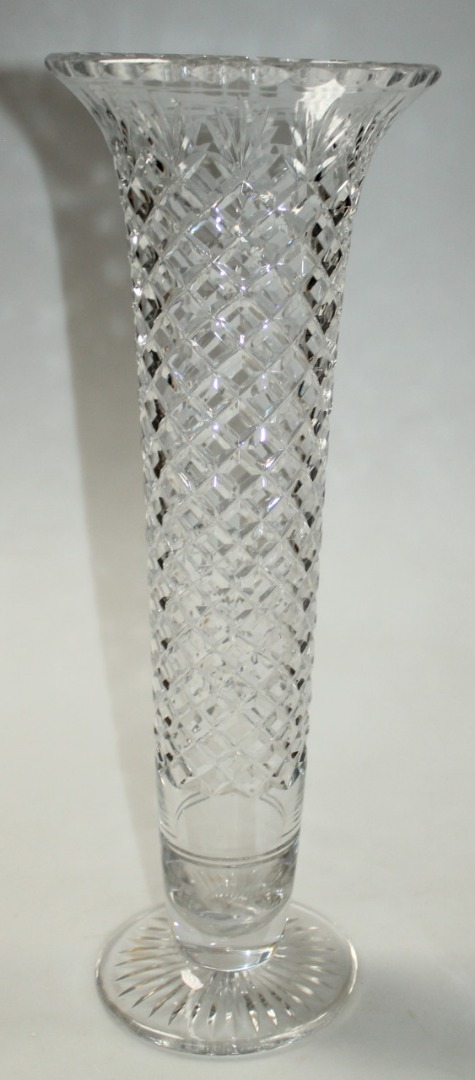 Appraisal: A thC glass vase with a trumpet outline hobnail cut