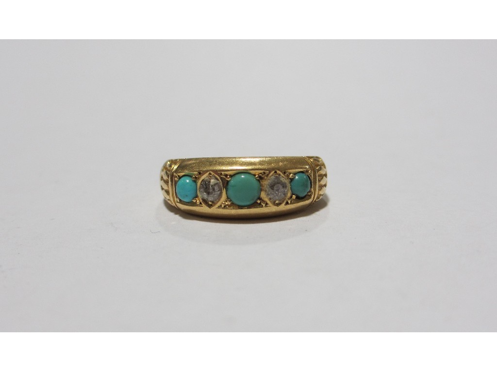 Appraisal: Eighteen carat gold turquoise and diamond five stone ring