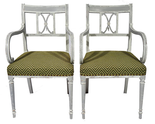 Appraisal: A PAIR OF SWEDISH STYLE PAINTED ARMCHAIRS in a neo