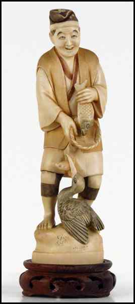 Appraisal: JAPANESE CARVED IVORY FIGURE OF A FISHERMAN Provenance The Collection