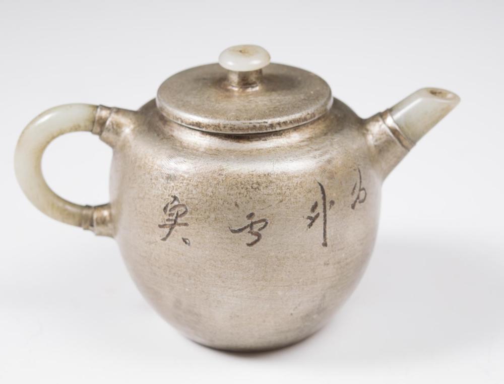 Appraisal: CHINESE ZISHA TEAPOT tin covered with carved calligraphy decoration and