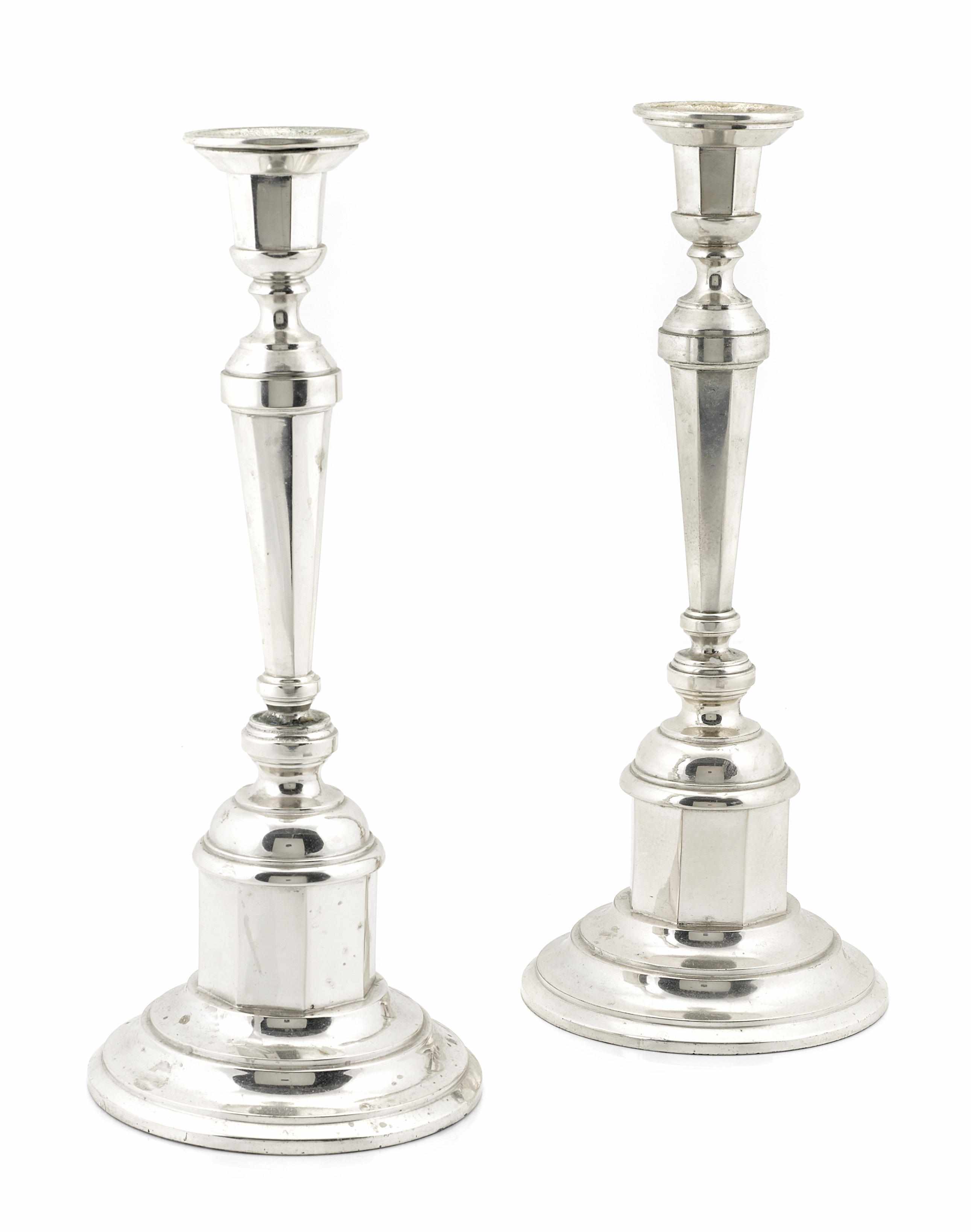 Appraisal: A pair of Czechoslovakian standard silver candlesticks Maker's mark ''HG''