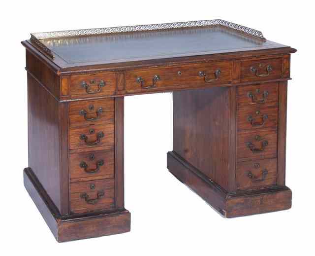 Appraisal: A VICTORIAN ROSEWOOD LIBRARY PEDESTAL DESK the top with gilt