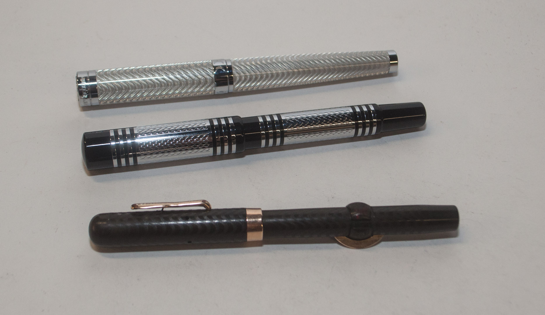 Appraisal: Three Conklin fountain pens one with K gold nib