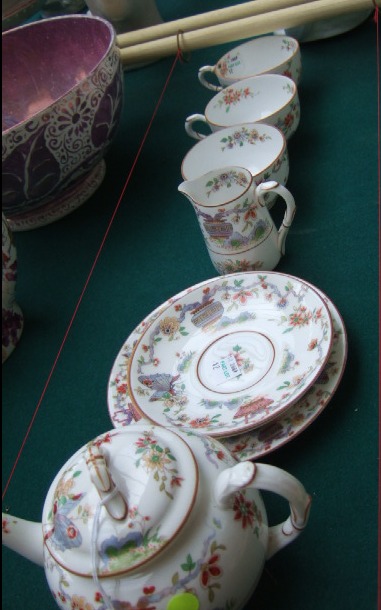 Appraisal: A Royal Worcester porcelain tea service for two decorated in