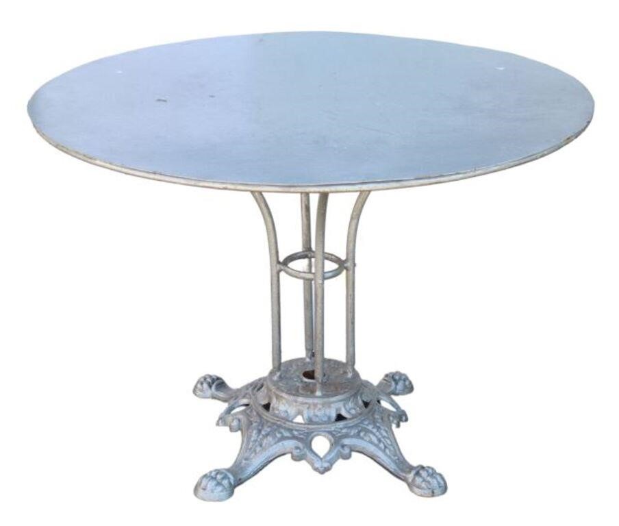 Appraisal: French cast iron bistro table round iron top rising on