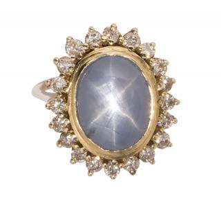 Appraisal: Star sapphire diamond and k yellow gold ring Star sapphire