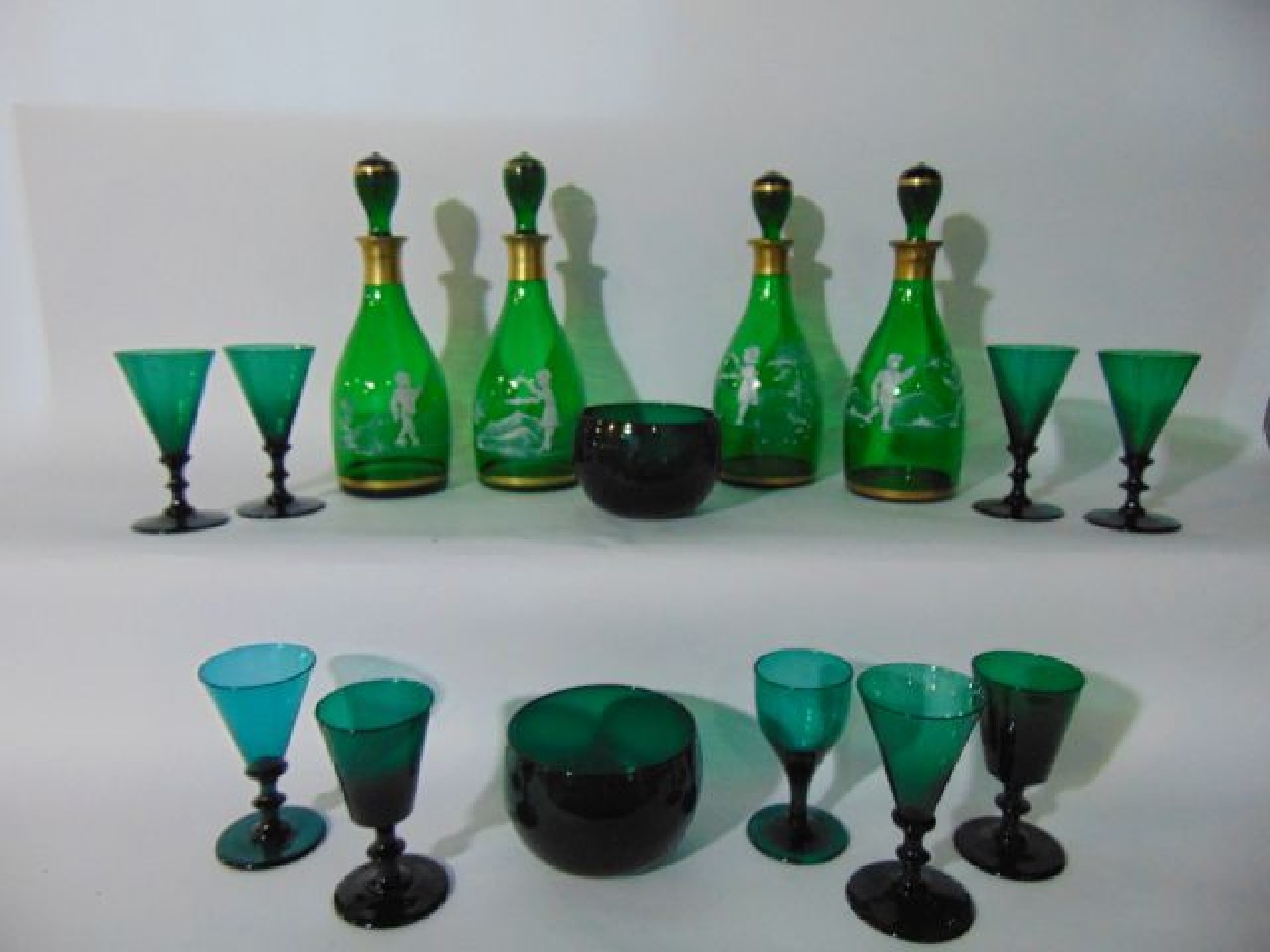 Appraisal: Two pairs of th century green glass decanters with gilded