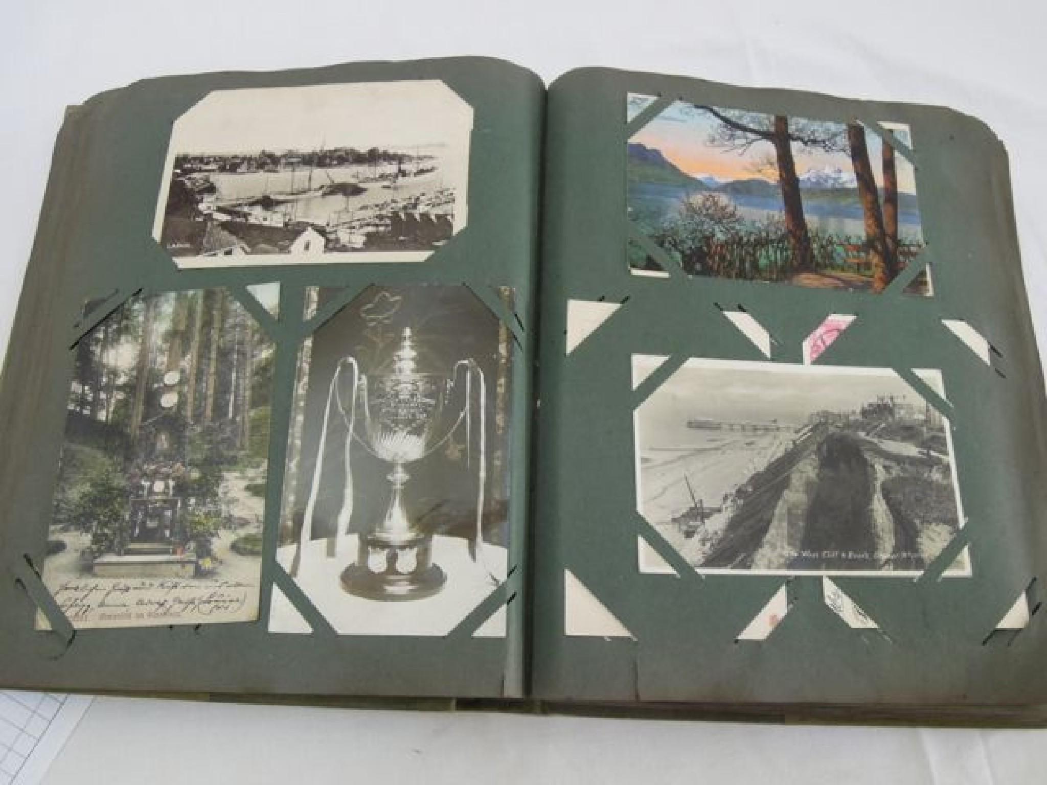 Appraisal: A large cloth covered Post Card Album containing a quantity