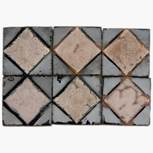 Appraisal: GRUEBY One hundred eighty geometric tiles with a raised ivory