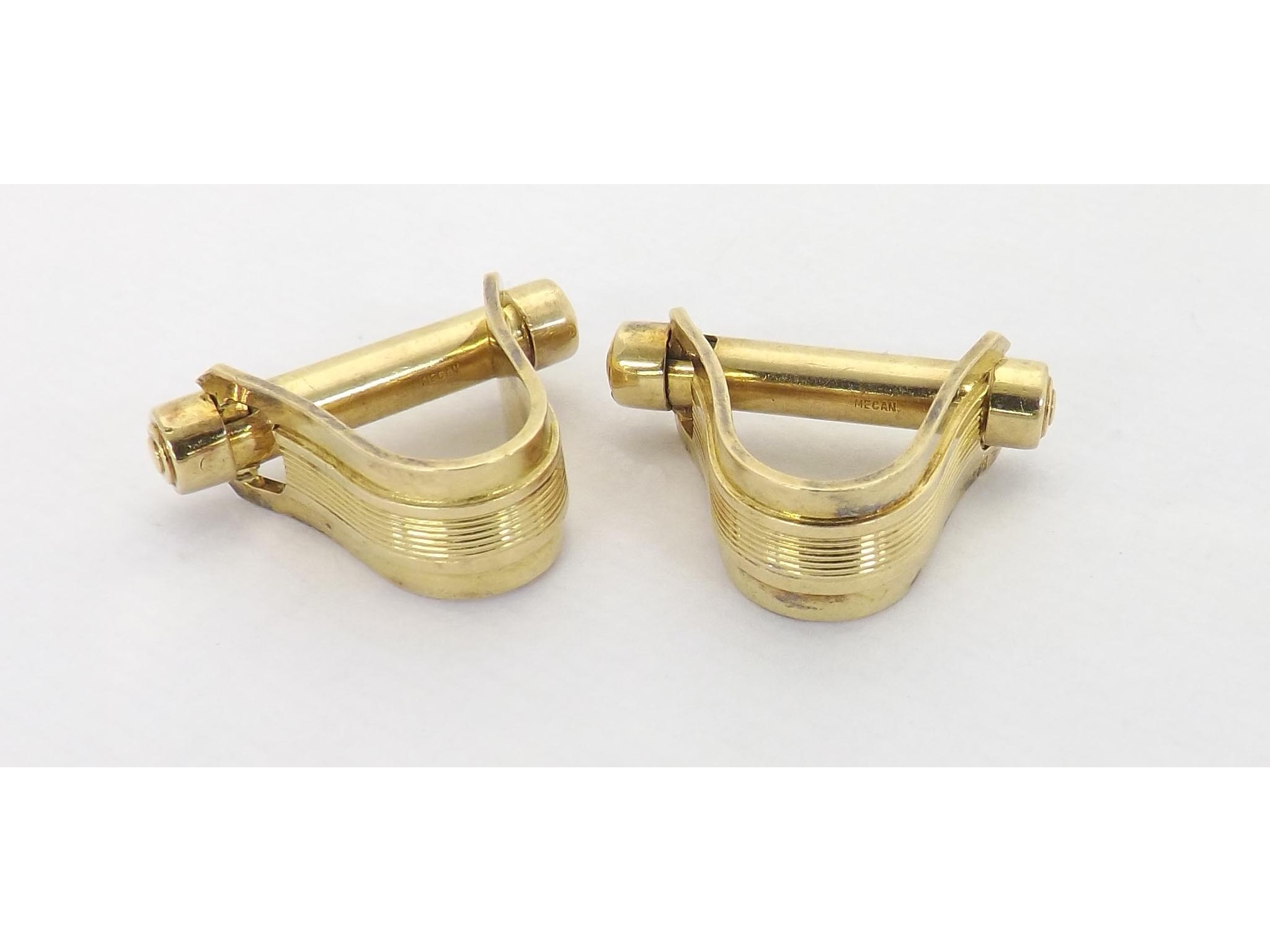 Appraisal: Pair of k yellow gold cufflinks stamped 'Megan' Megan Auman