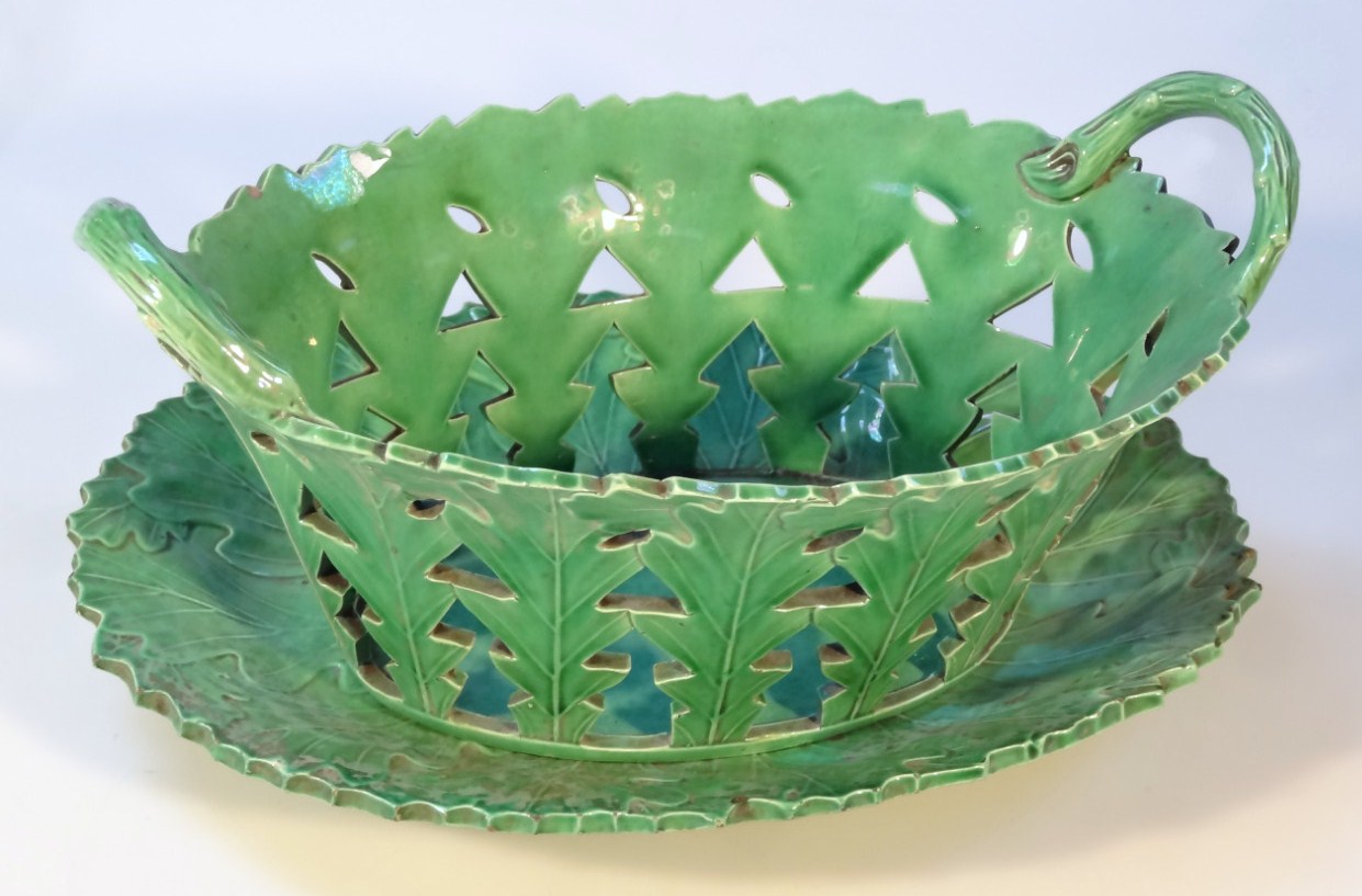 Appraisal: An early thC Staffordshire pottery chestnut basket on associated stand