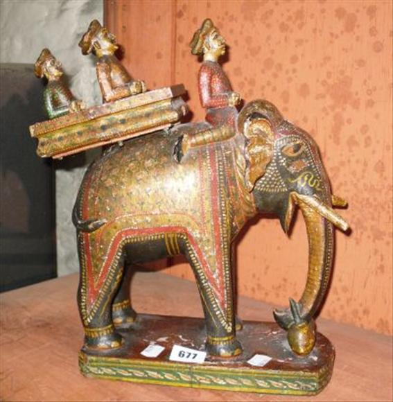 Appraisal: A polychrome decorated Rajahstani elephant and howdah