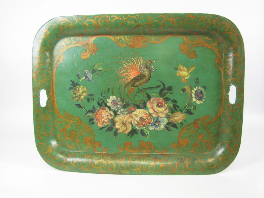 Appraisal: A Toleware two handled rectangular Tray painted bird of paradise