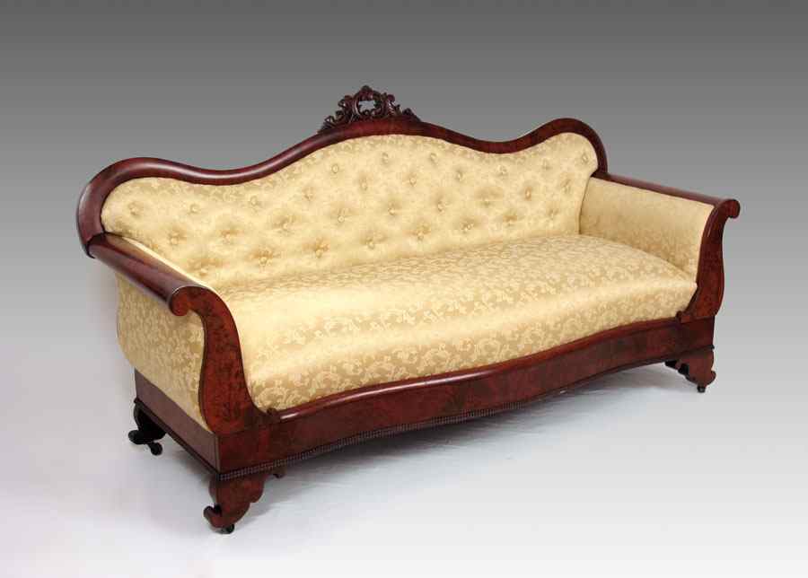 Appraisal: AMERICAN EMPIRE PERIOD SOFA Carved decoration on top rail gold