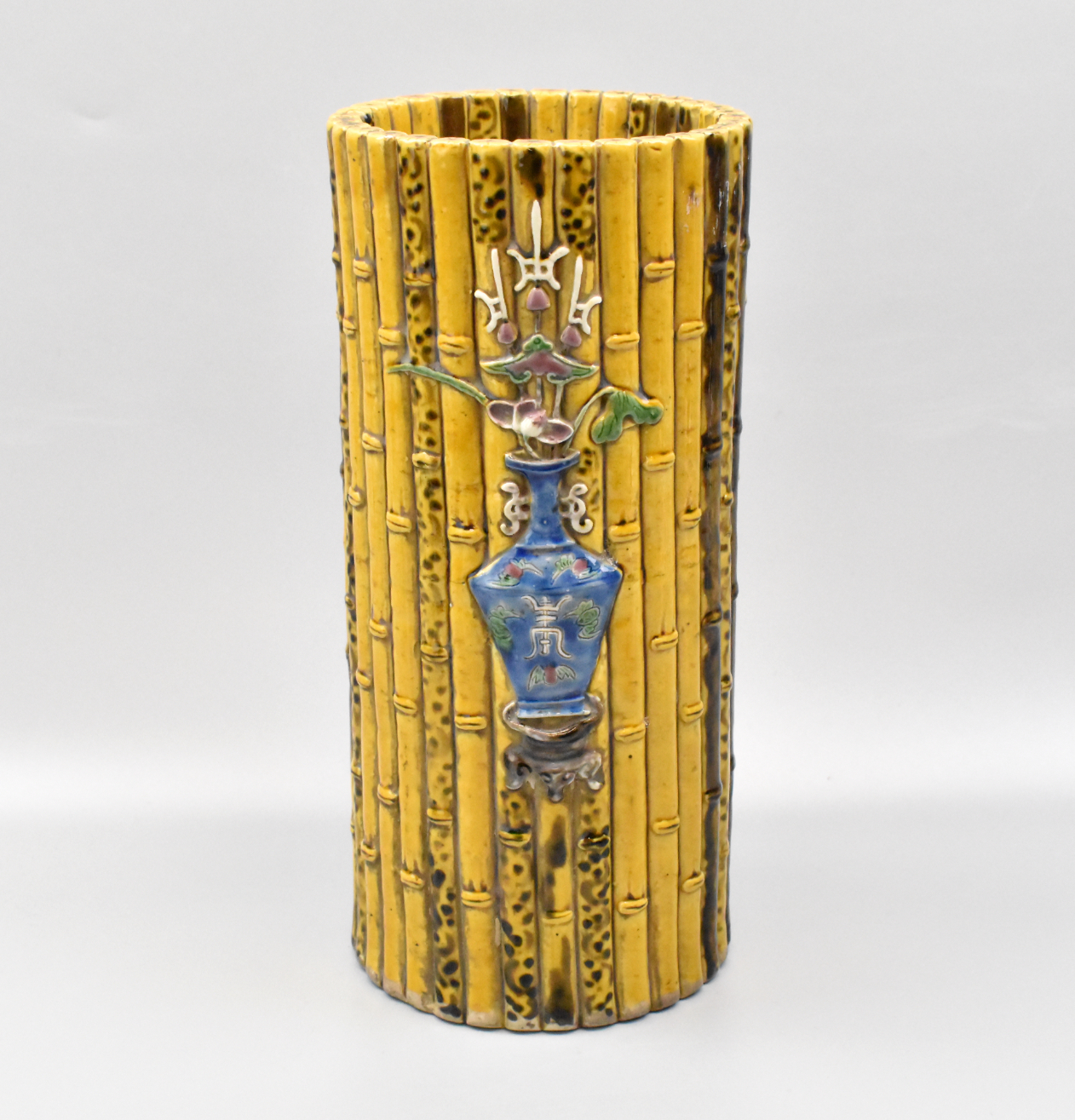 Appraisal: A Chinese sancai glazed yellow hat vase with Moriage design