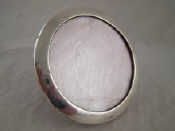 Appraisal: A circular silver photo frame with strut back cm dia