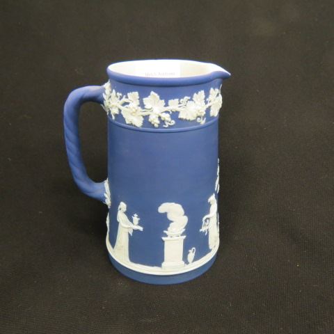 Appraisal: Wedgwood Dark Blue Jasperware Pitcher classical figures in the garden