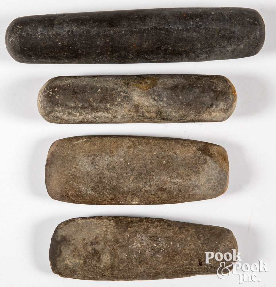 Appraisal: Four prehistoric stone artifacts Four prehistoric stone artifacts to include