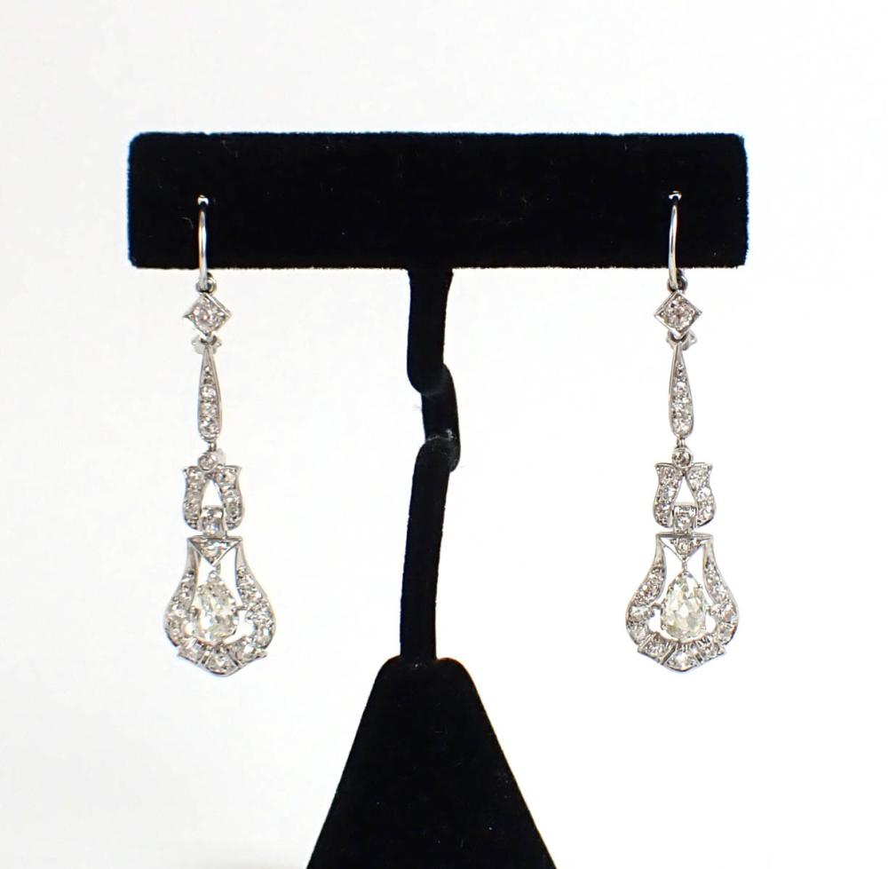 Appraisal: PAIR OF VINTAGE ESTATE DIAMOND AND PLATINUM PENDANT EARRINGS each