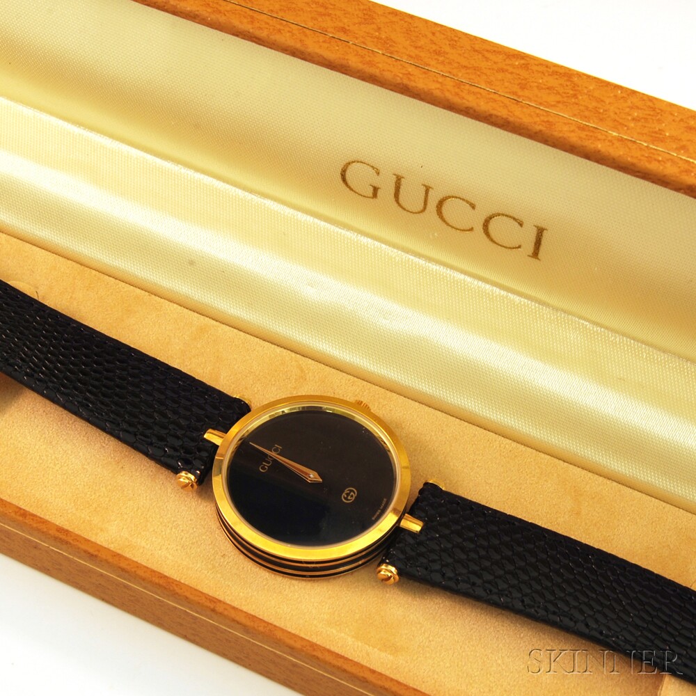 Appraisal: Gucci Model Black and kt Yellow Gold-plated Wristwatch lacking numeral