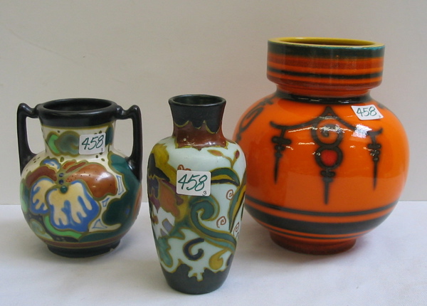 Appraisal: A GROUP OF THREE DUTCH GOUDA STYLE VASES One is