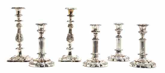 Appraisal: A Set of Four Sheffield Plate Candlesticks having a baluster