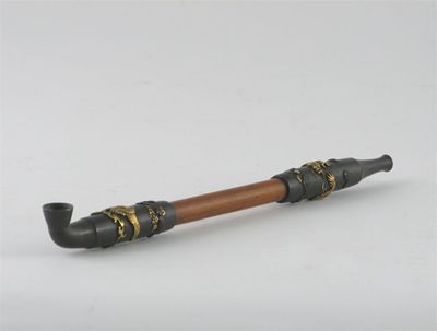 Appraisal: A Japanese opium pipe the bowl and mouth piece onlaid