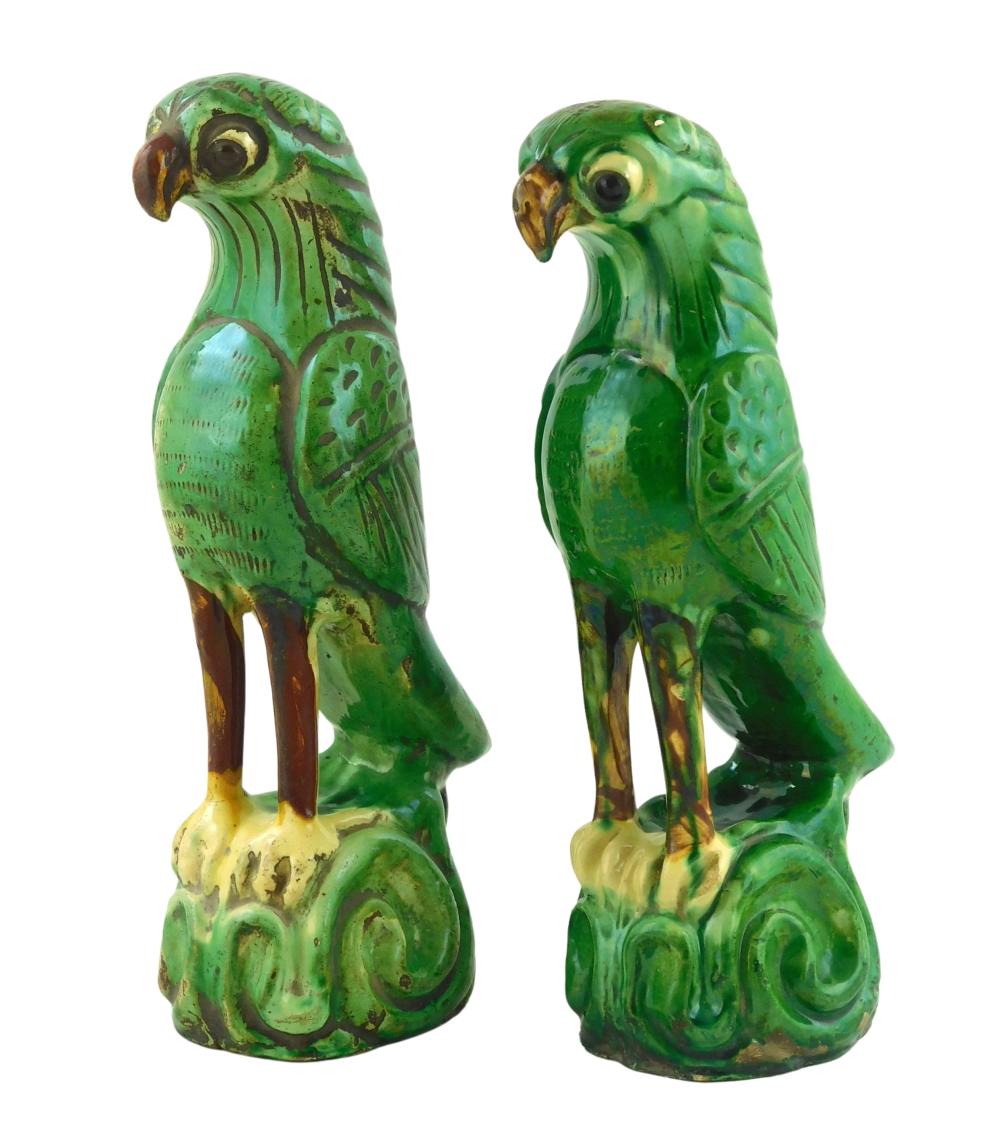 Appraisal: ASIAN Pair of Chinese Sancia glazed parrots green bodies with