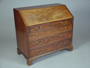 Appraisal: A Georgian mahogany bureau late th century the cleated fall