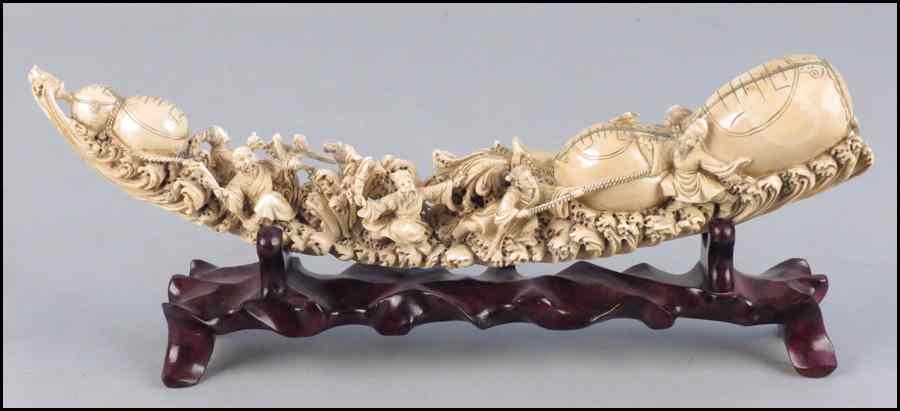 Appraisal: CHINESE CARVED IVORY TUSK Depicting a processional of eight immortals