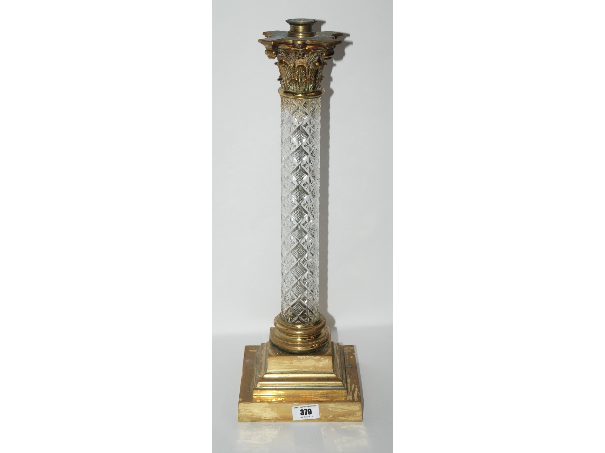 Appraisal: A cut glass and brass Corinthian column