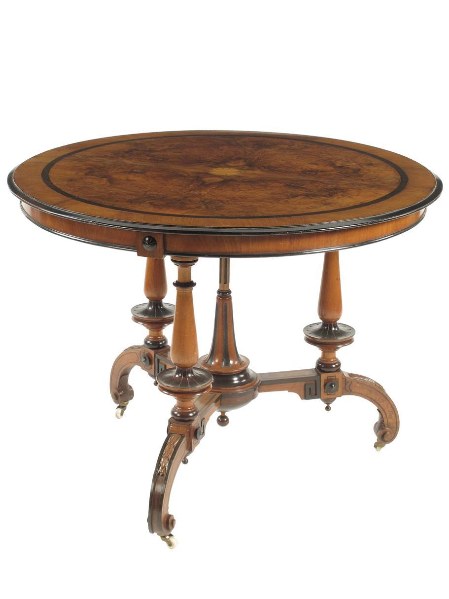 Appraisal: A th century Aesthetic walnut and ebonised centre table