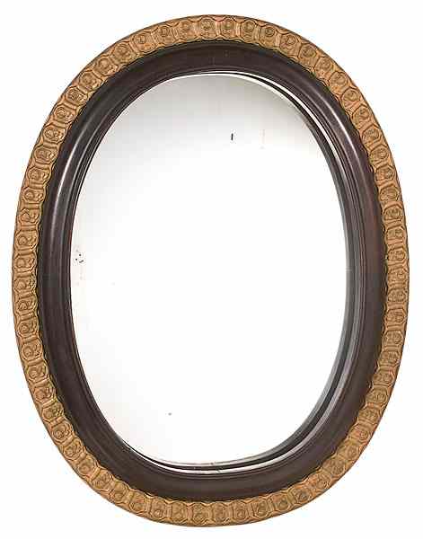 Appraisal: English Mirror English ca s an oval mirror in double