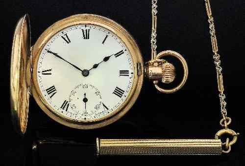 Appraisal: A George V ct gold half hunting cased Swiss keyless