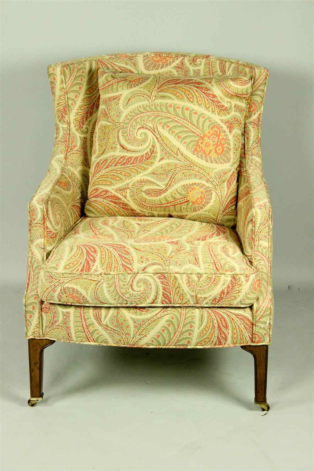 Appraisal: SCHUMACHER PAISLEY UPHOLSTERED CHAIR having a rounded back with large