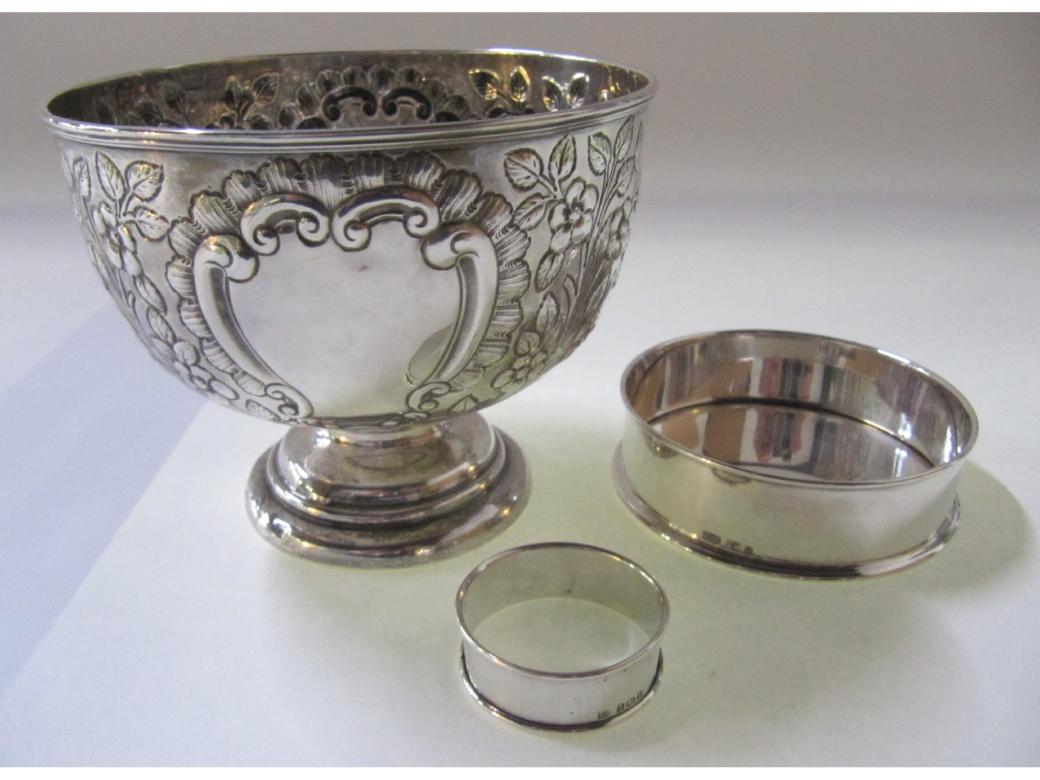 Appraisal: A lot comprising a silver rose-bowl Chester a silver napkin