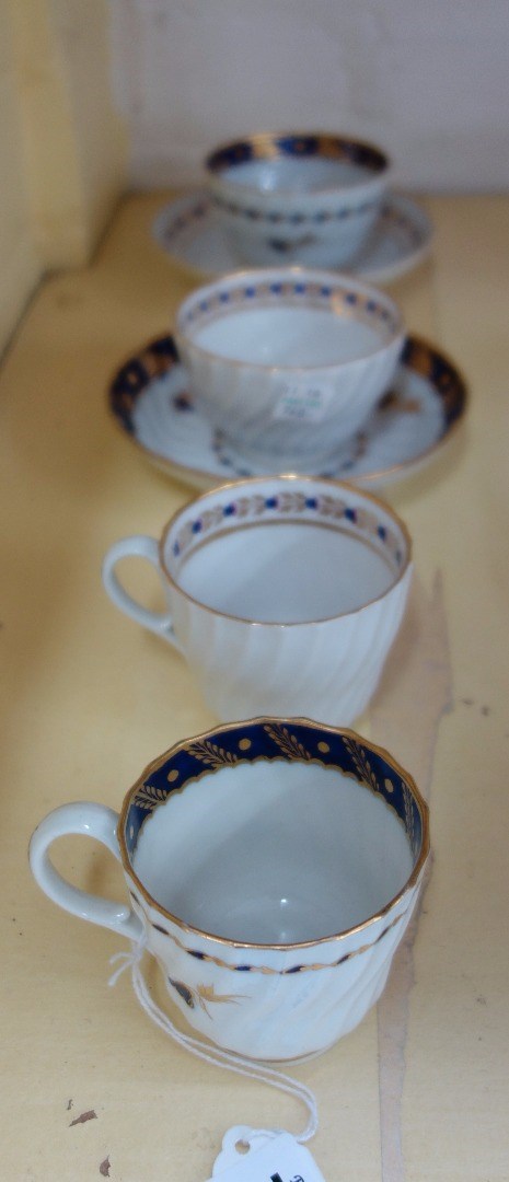 Appraisal: A Flight Worcester spiral fluted blue and gilt coffee cup