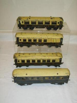 Appraisal: Four playworn Hornby No Pullman coaches including a blue train