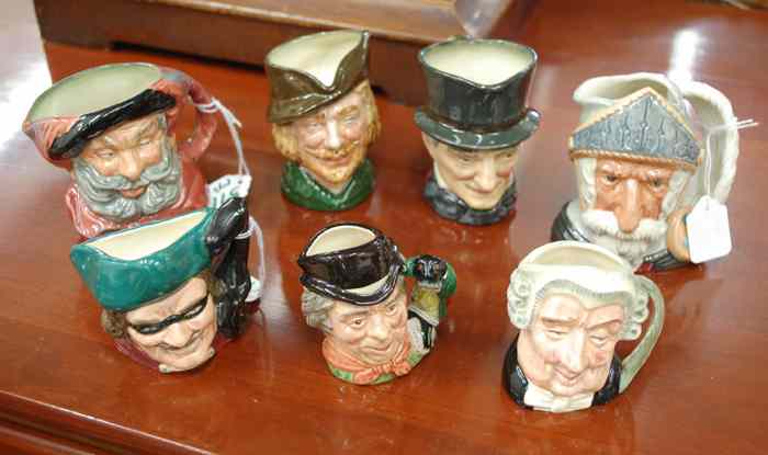 Appraisal: SEVEN ROYAL DOULTON CHARACTER JUGS four are small John Peel