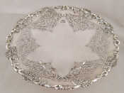 Appraisal: A silver cake stand pierced and with applied cast rim