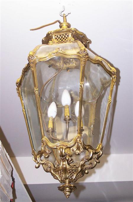 Appraisal: A Chippendale style gilt metal hall lantern of rococo facted