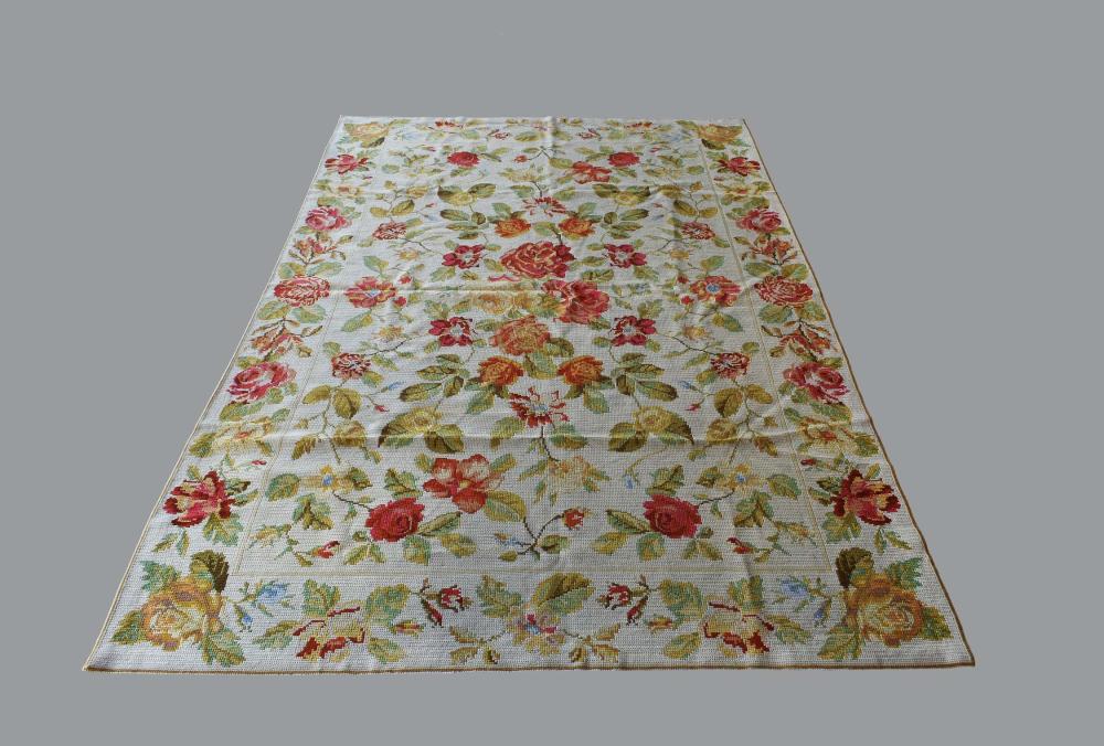 Appraisal: NEEDLEPOINT CARPETThe cream ground dotted allover with large colorful foliate