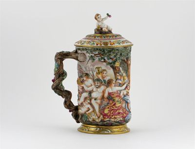 Appraisal: A Continental Doccia-style jug and cover moulded in deep relief