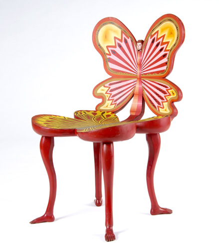 Appraisal: PEDRO FRIEDEBERG Butterfly chair with human head and feet the