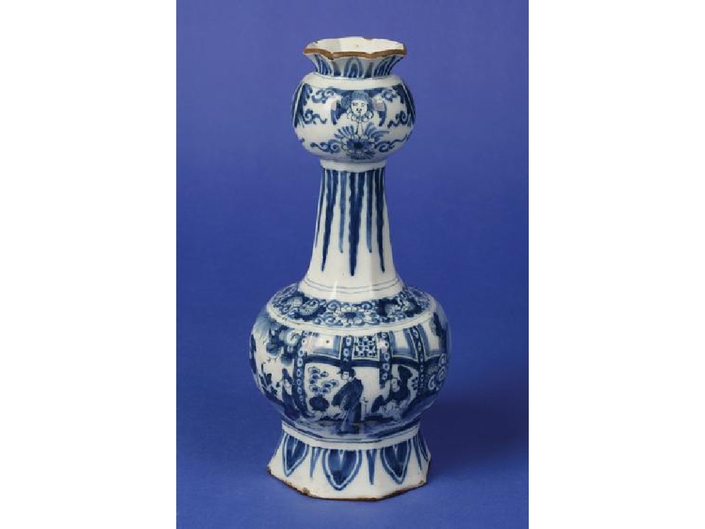 Appraisal: A DELFTWARE BLUE AND WHITE ONION VASE decorated with stiff