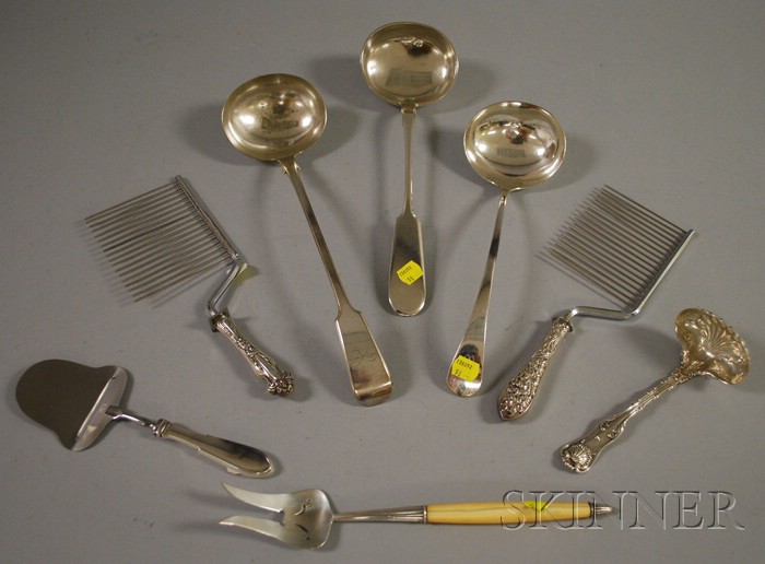 Appraisal: Eight Sterling and Sterling-Handled Flatware Servers a Russian soup ladle